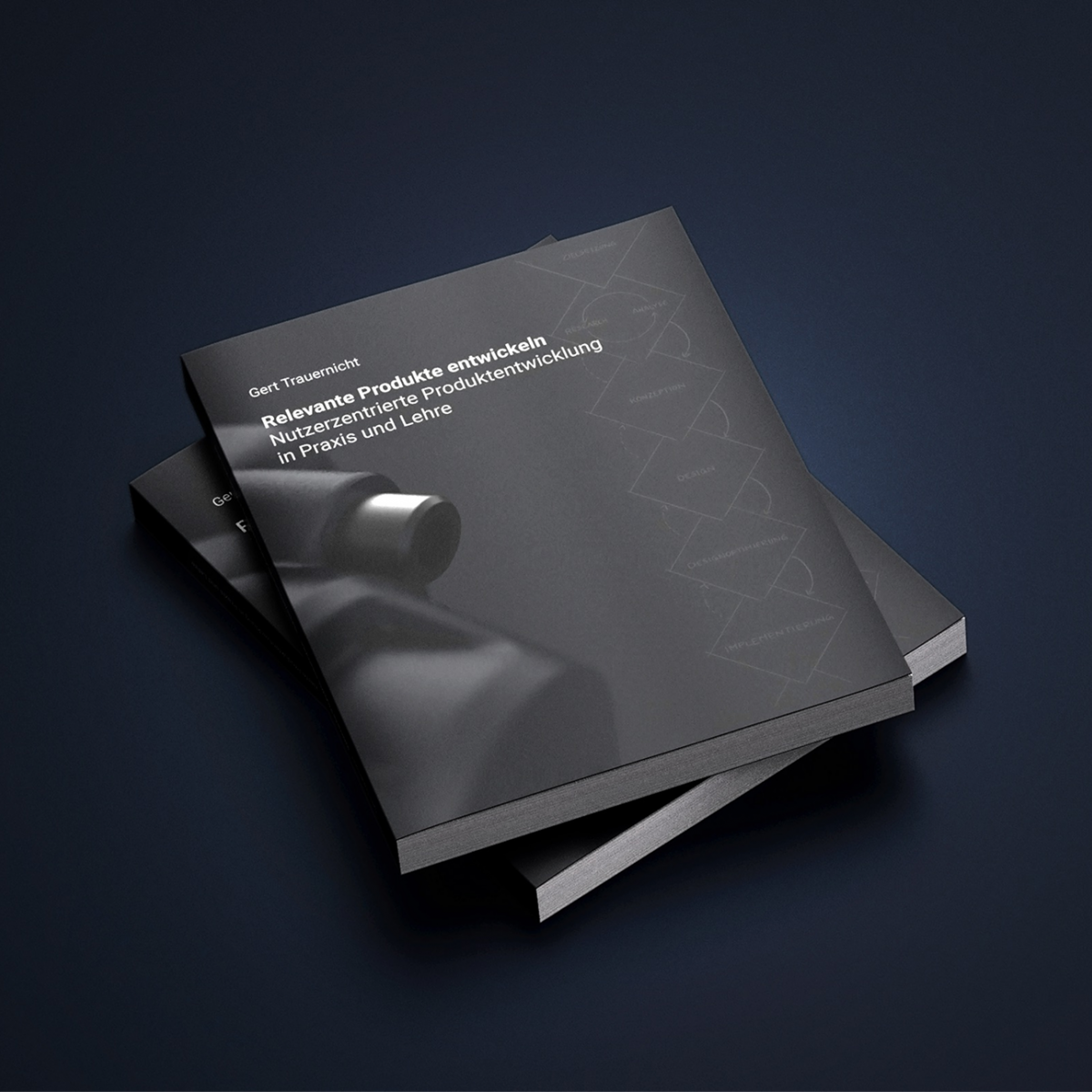 Seitenansicht von zwei Ausgaben des Buchs von Gert Trauernicht 