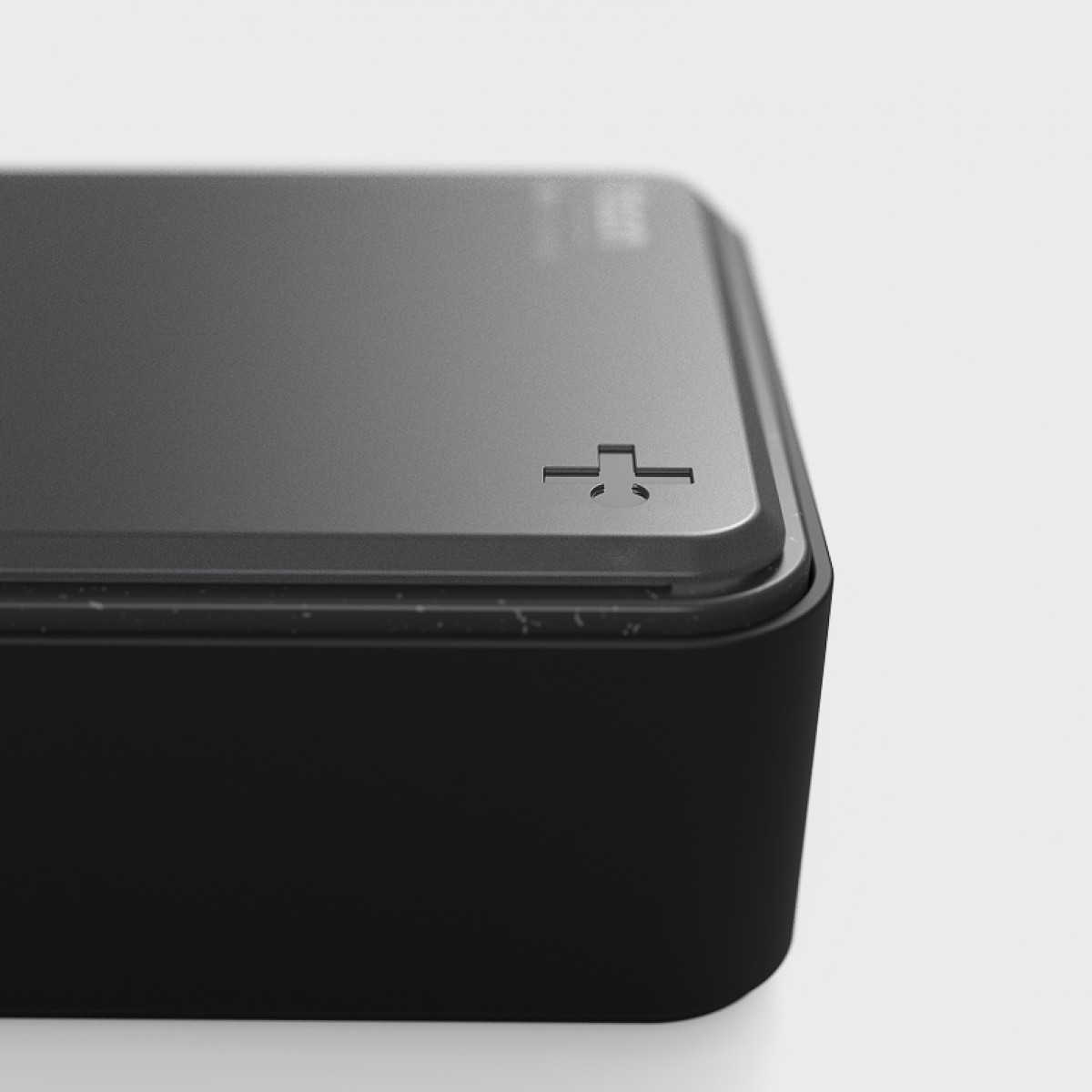 Detail of an edge of the ITSON charger designed by Squareone with focus on branding and material