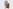 Rendering of two power banks in a vacuum, positioned so that both the front and back are visible, with an orange bumper