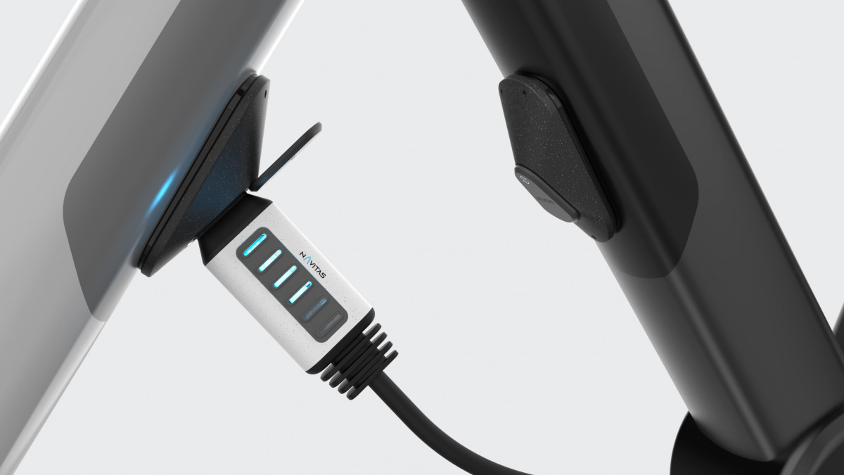 Close-up view of an e-bike being charged with a retrofitted battery.
