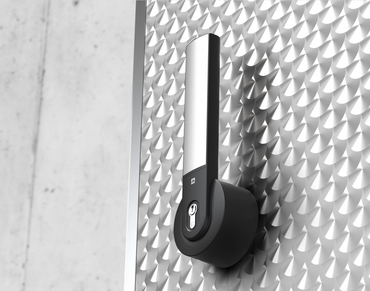 A cold room handle from the Varilox series by STUV mounted on a door, frog's-eye view