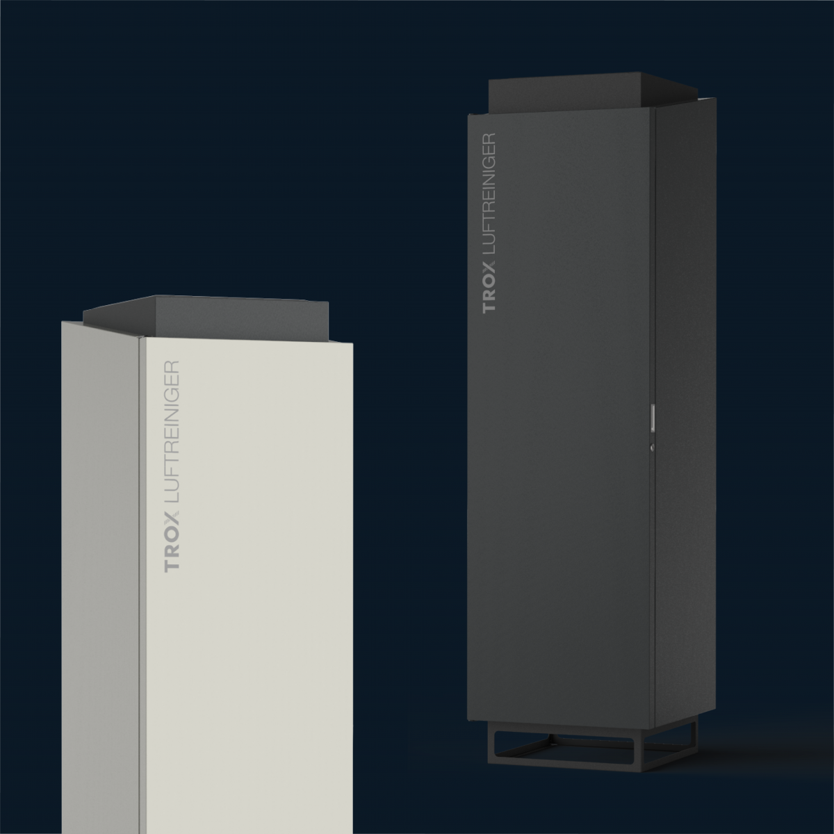 Zwei Trox-Luftfilter, ein weißer und ein schwarzer auf dunklem Hintergrund