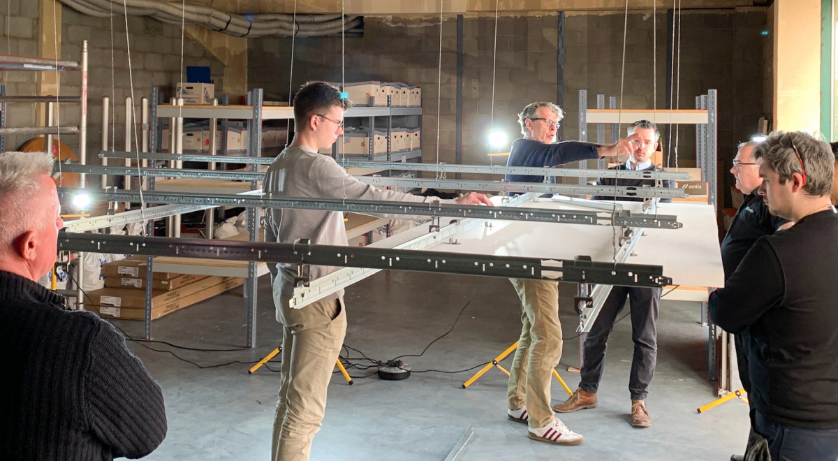 Squareone visits Zentia in England to test the functionality and aesthetics of the prototype for the new ceiling mounting system.